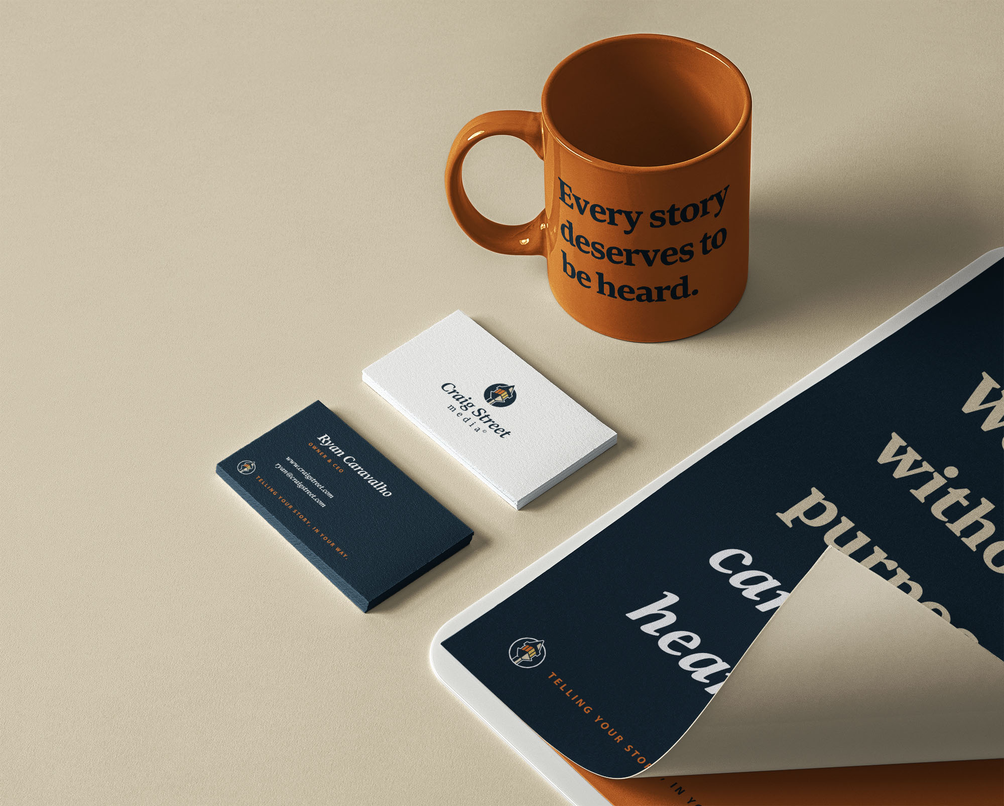 A branded coffee mug, business cards, and folder for Craig Street Media