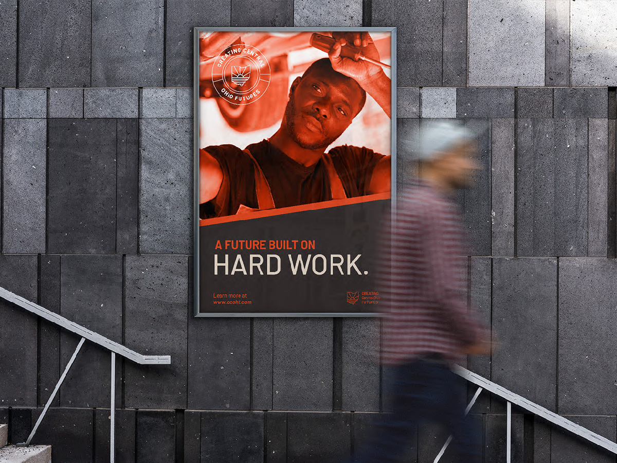 Large designed poster with man walking by